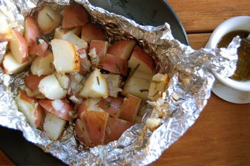 Potatoes in tinfoil on the BBQ